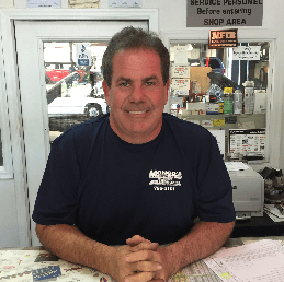 Man smiling — mechanic in Cinnaminson, NJ