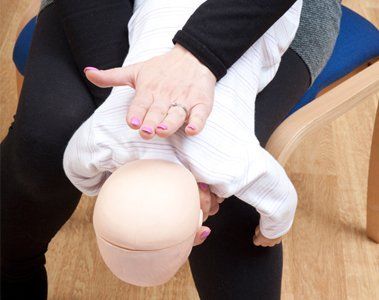CPR pracitse on baby manikin 