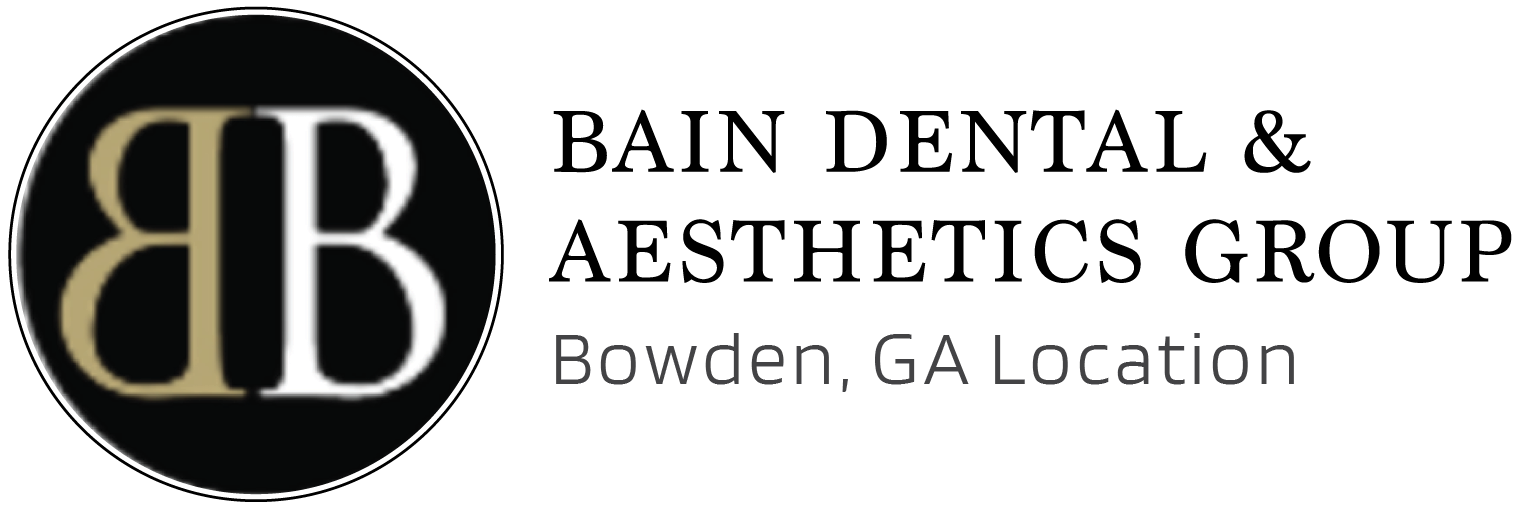 A logo for bain dental and aesthetics group