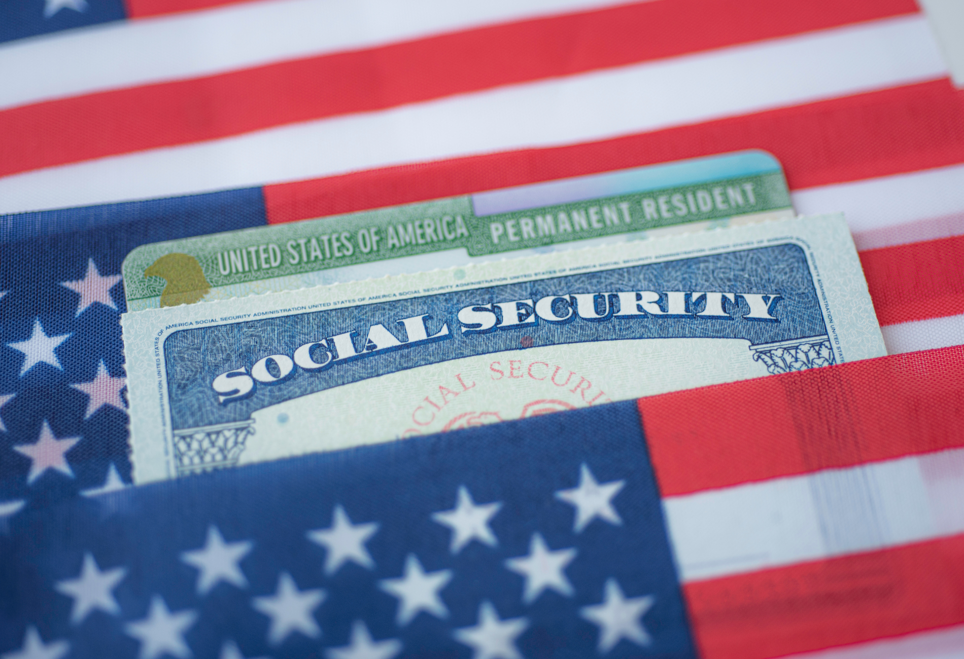 A judge is sitting at a table with a gavel and scales of justice.