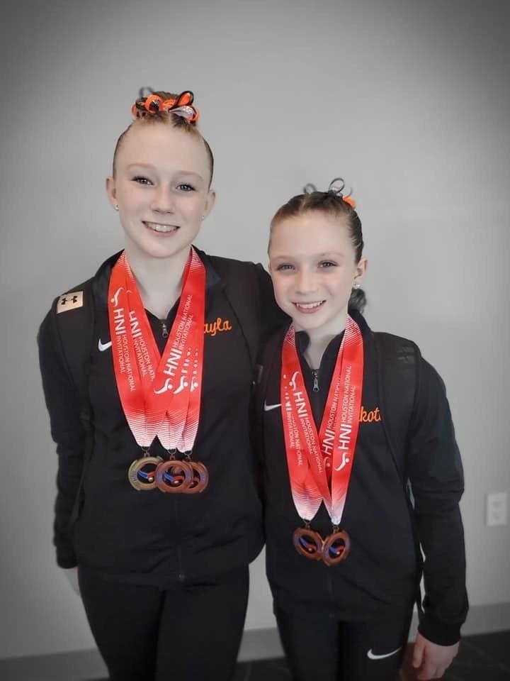 Two Girls With Medals