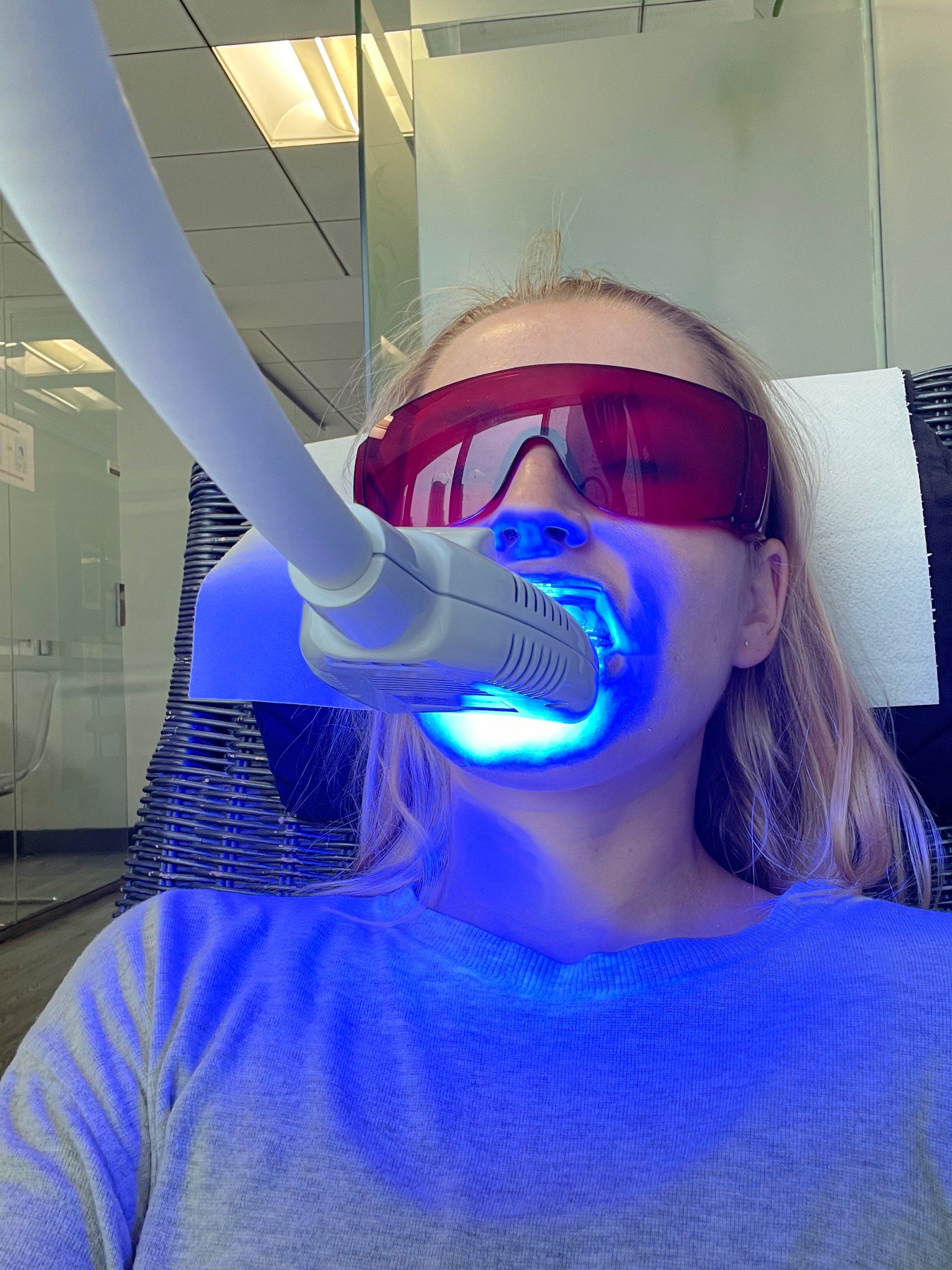 a woman getting her teeth whitened