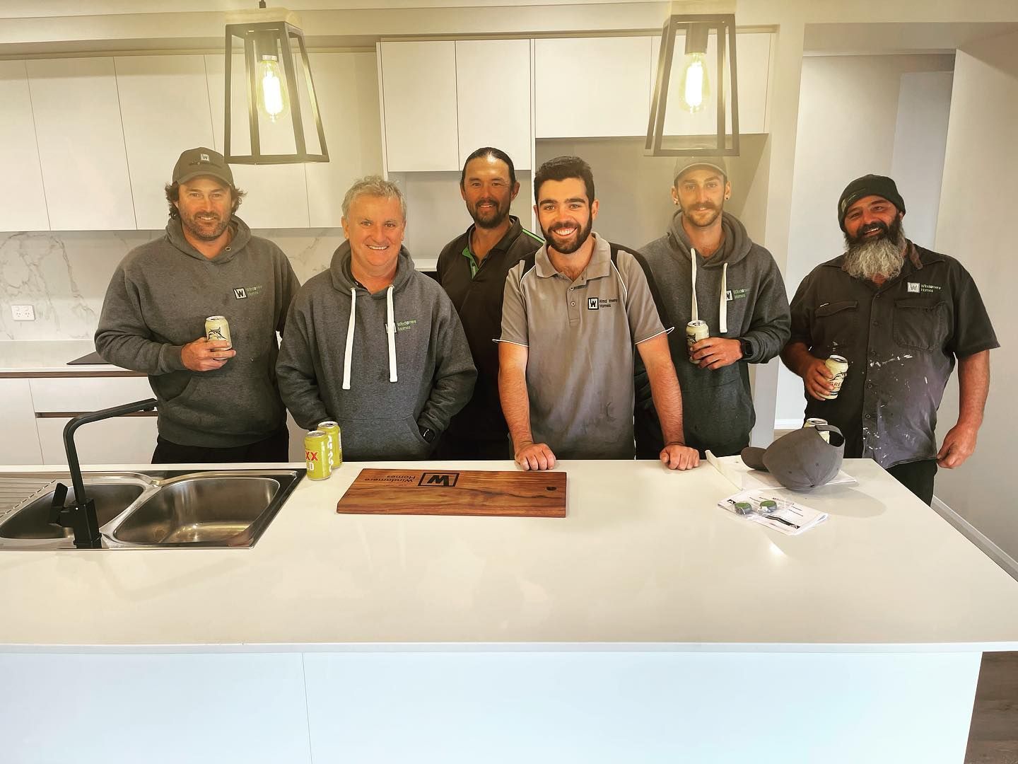 A Brick House With a Porch and a Lawn in Front of It — Windamere Homes in Highfields, QLD