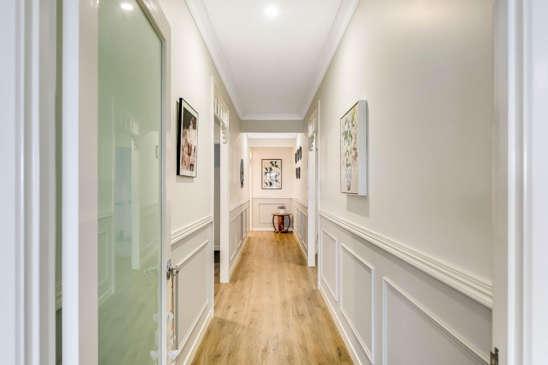 A Hallway With Walls and Floors — Windamere Homes in Highfields, QLD
