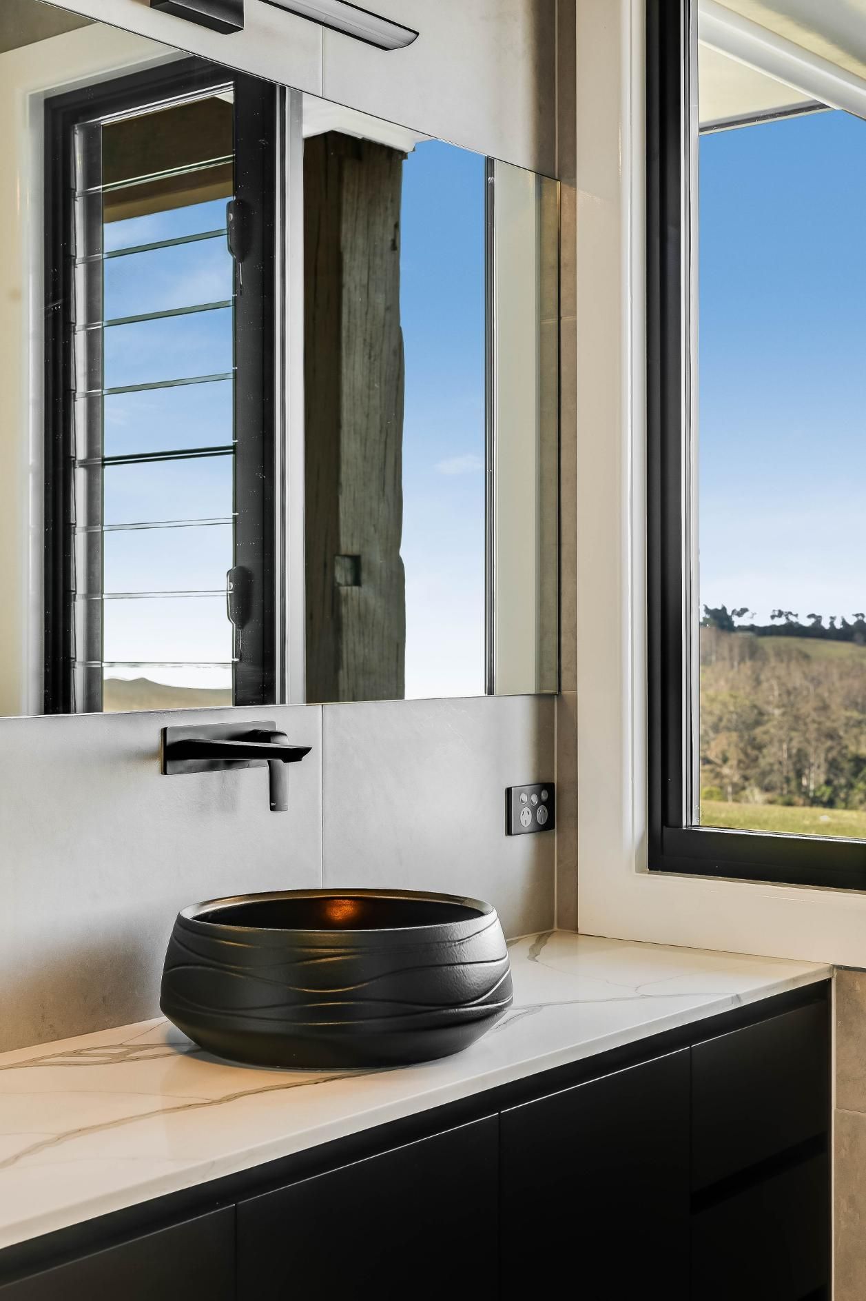 A Bathroom With a Sink and Window — Windamere Homes in Highfields, QLD