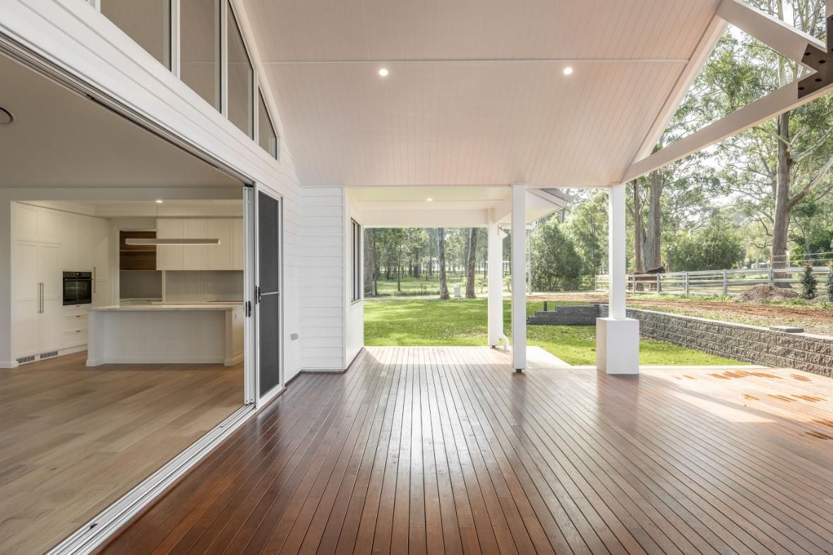 An Empty House With a Glass Doors — Windamere Homes in Highfields, QLD