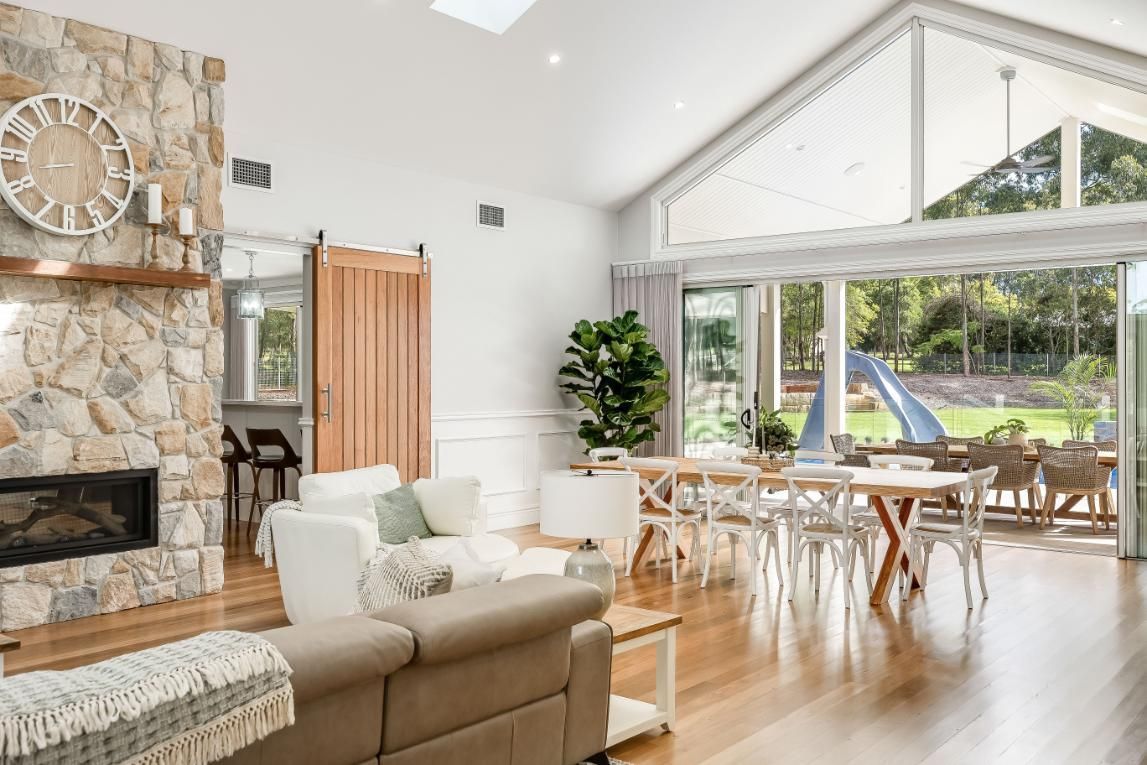 A Living Room Filled With Furniture — Windamere Homes in Highfields, QLD