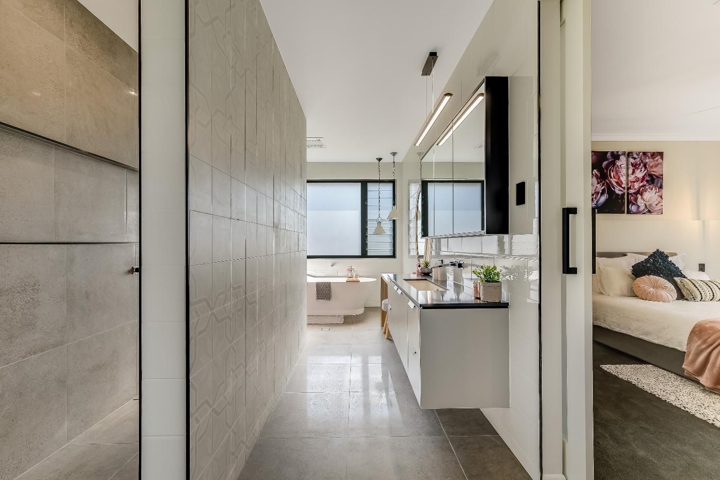 A Hallway Leading to a Bedroom — Windamere Homes in Highfields, QLD