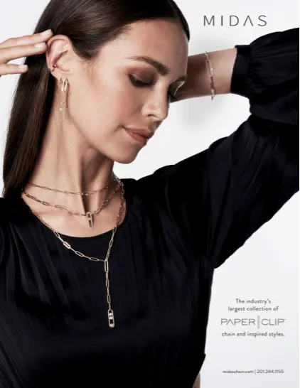 A woman wearing a necklace and earrings from midas