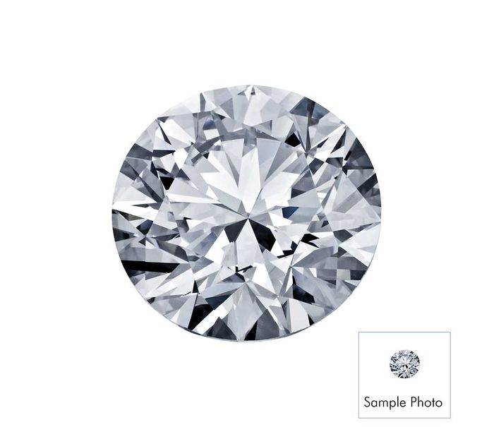 A close up of a round diamond on a white background.