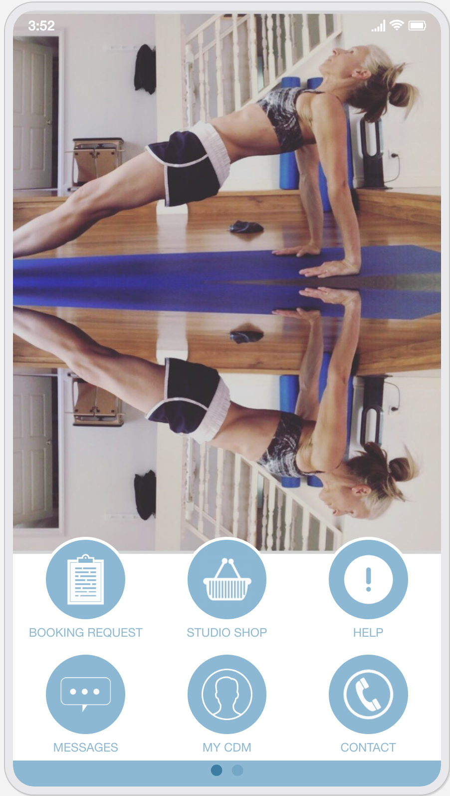 A woman is doing push ups on a yoga mat on a phone screen.