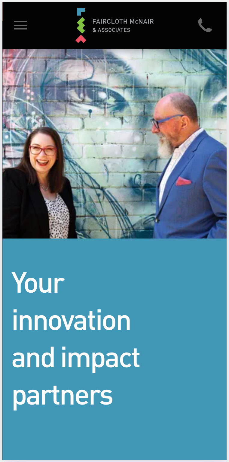 Owners of Faircloth McNair and associates are standing next to each other in front of a mural.