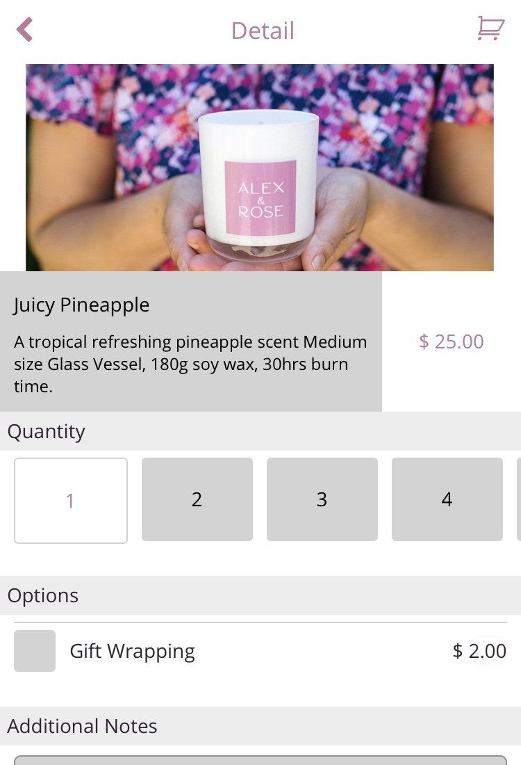 A woman is holding a candle in her hands.