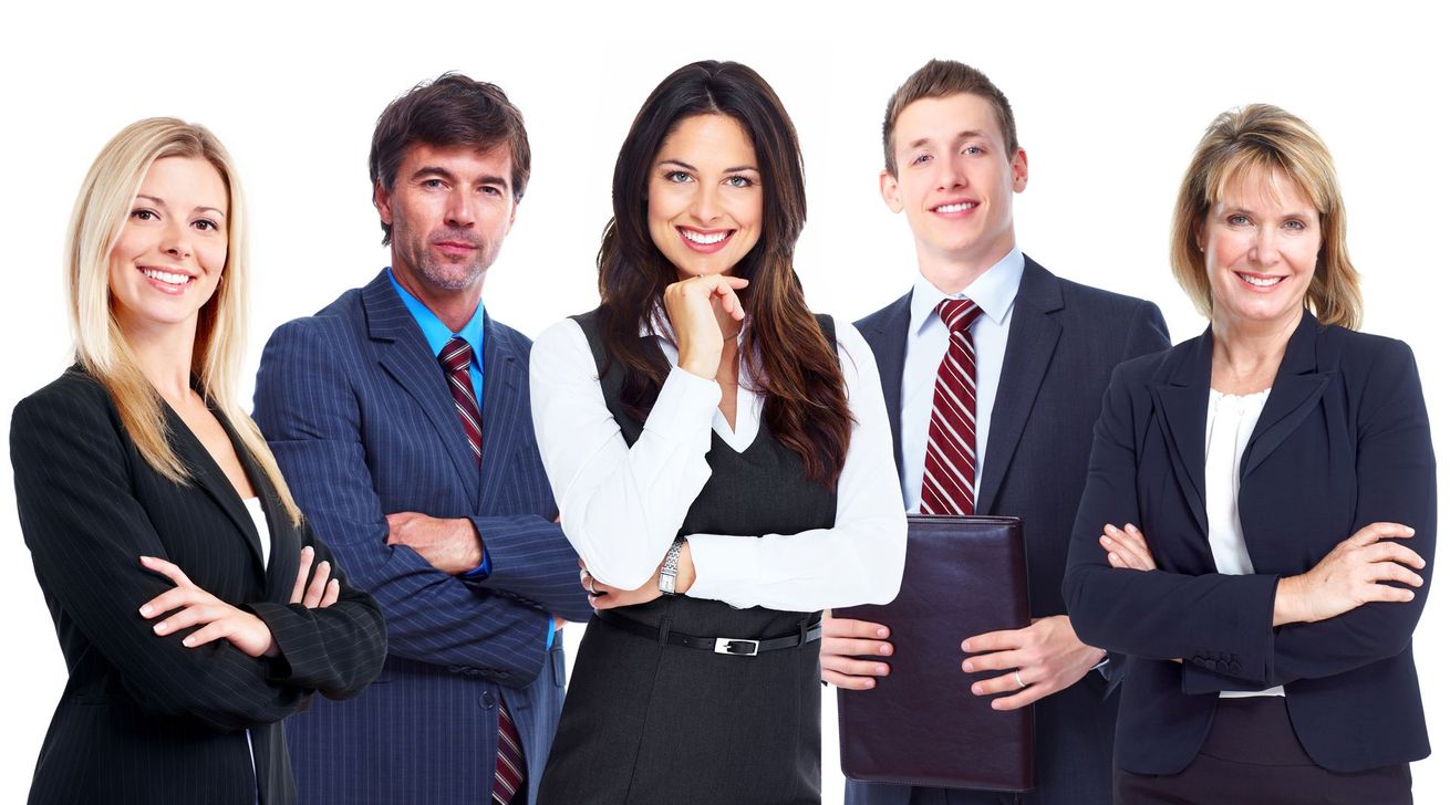 A group of business people posing for a picture with their arms crossed