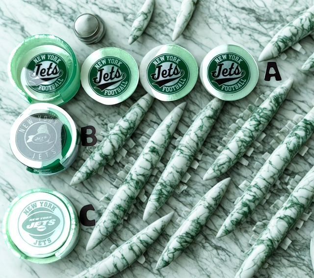 A bunch of new york jets memorabilia on a table