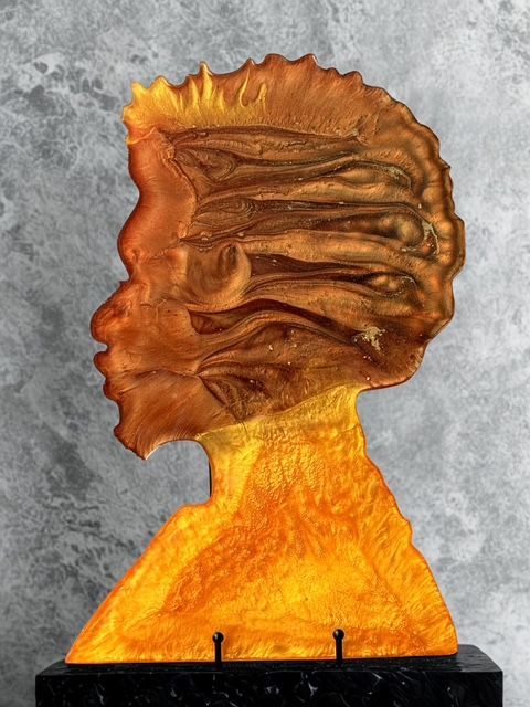 A person is looking at a box of silicone molds.