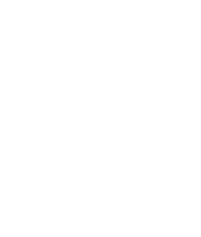 A person in a professional environment holds a smartphone while reviewing a digital document on a laptop screen.