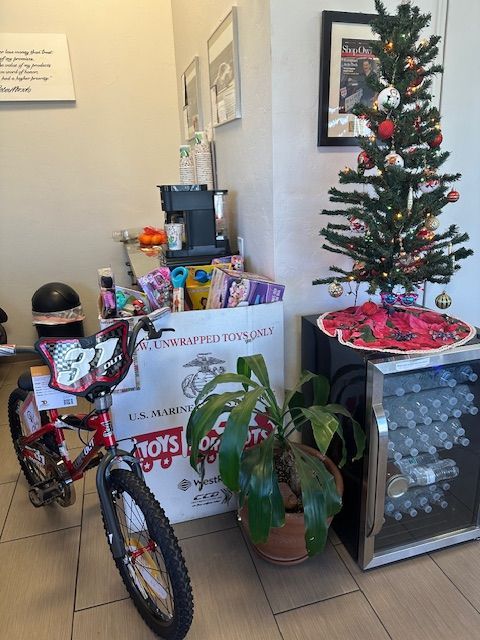 Box full of various toys in the office | European Auto Tech