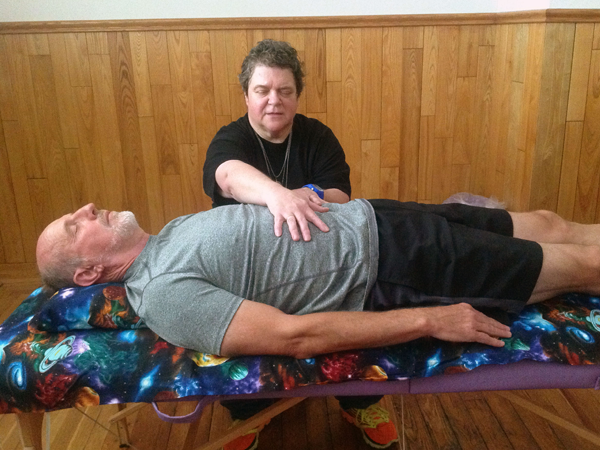 Doing Reiki on Bob
