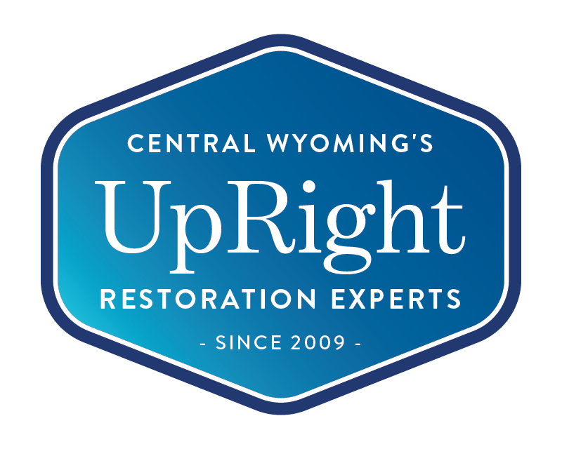 Logo for Central Wyoming's UpRight Restoration Experts. Blue and white with text and a date (since 2009).