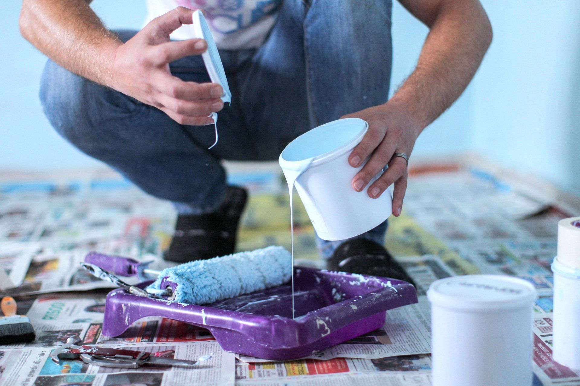 Pouring White Paint Into A Violet Tray — Newark, DE — Premier Touch Painting