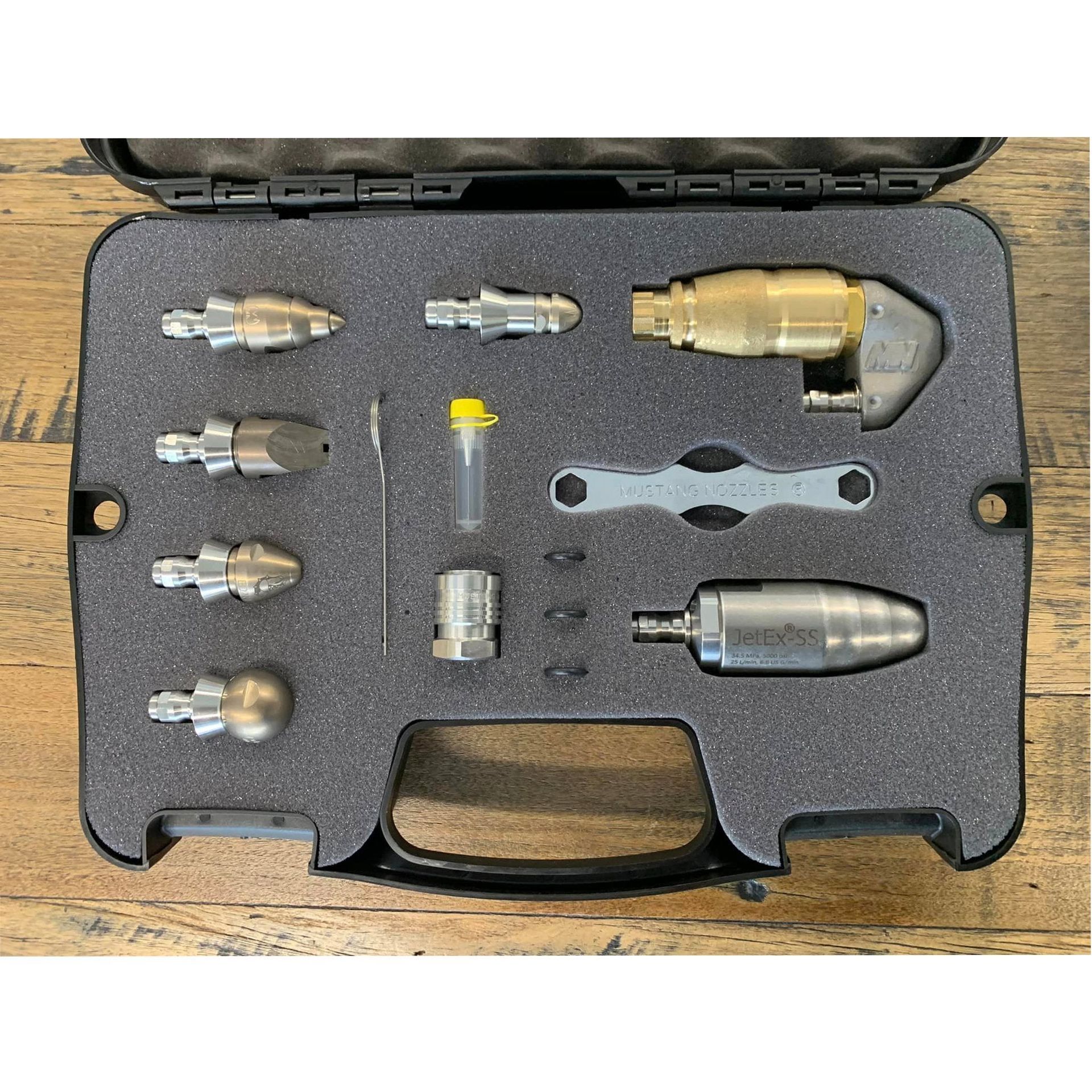 A Bunch Of Different Types Of Hydraulic Fittings Are Sitting On A Table — Torque Tech Supply & Repairs In Wauchope, NSW