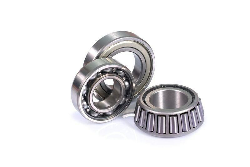 Three Bearings Are Sitting On Top Of Each Other On A White Surface — Torque Tech Supply & Repairs In Port Macquarie, NSW