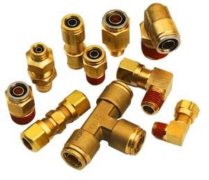 A Bunch Of Brass Fittings On A White Background — Torque Tech Supply & Repairs In Port Macquarie, NSW