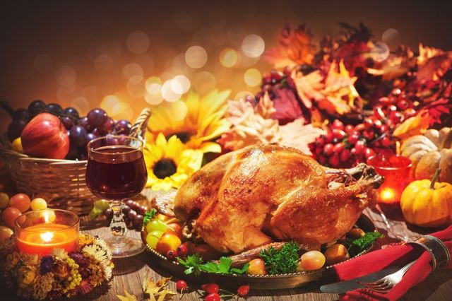 Turkey for Thanksgiving. Family cooking festive dinner