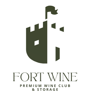 A logo for fort wine with a castle and grapes