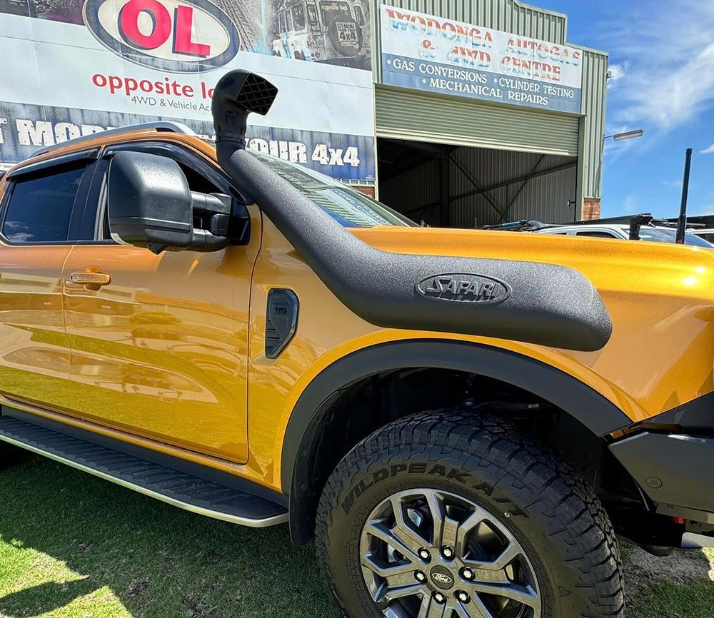 Gold Ford Ranger 4x4 With A Snorkel — Opposite Lock In Wodonga, VIC