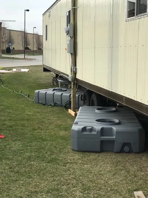 Tanks Behind a Trailer - Newton, WI - Maynard's Neat N Clean Portables