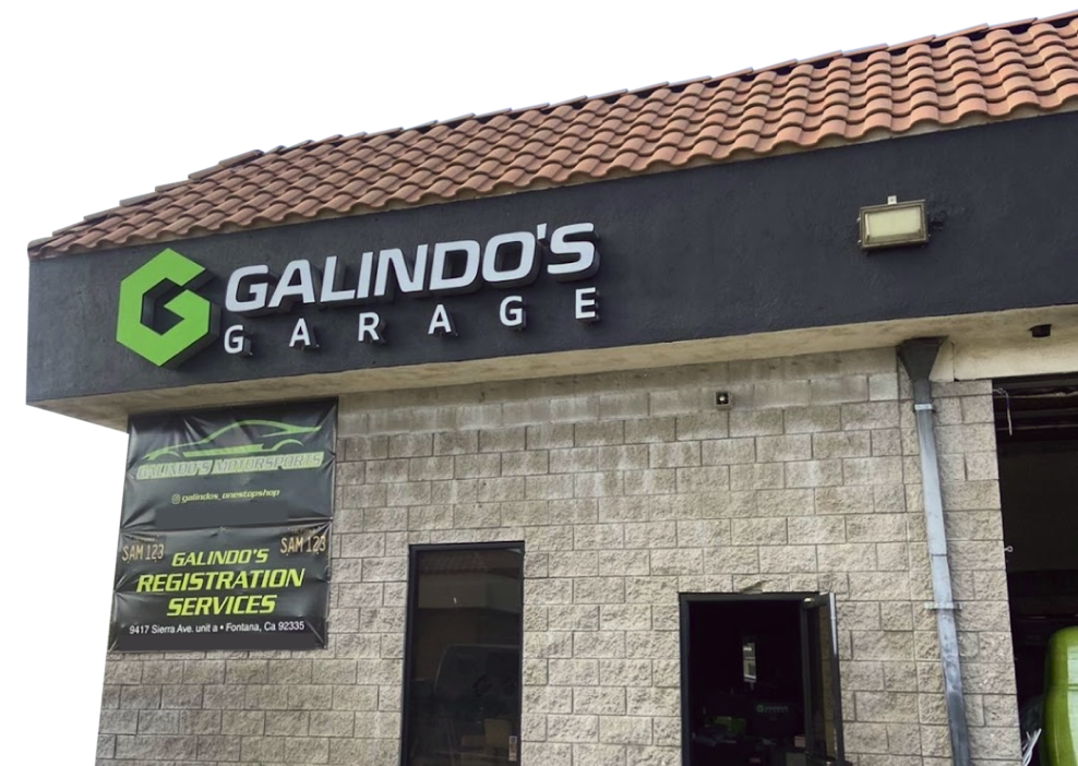 A building with a sign that says galindo 's garage | Galindo's Garage