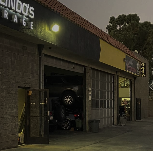 A car is in the garage of Galindo 's garage | Galindo's Garage