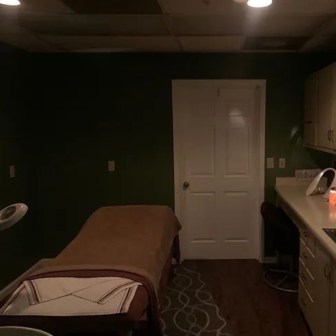 There is a bed in the middle of the room.