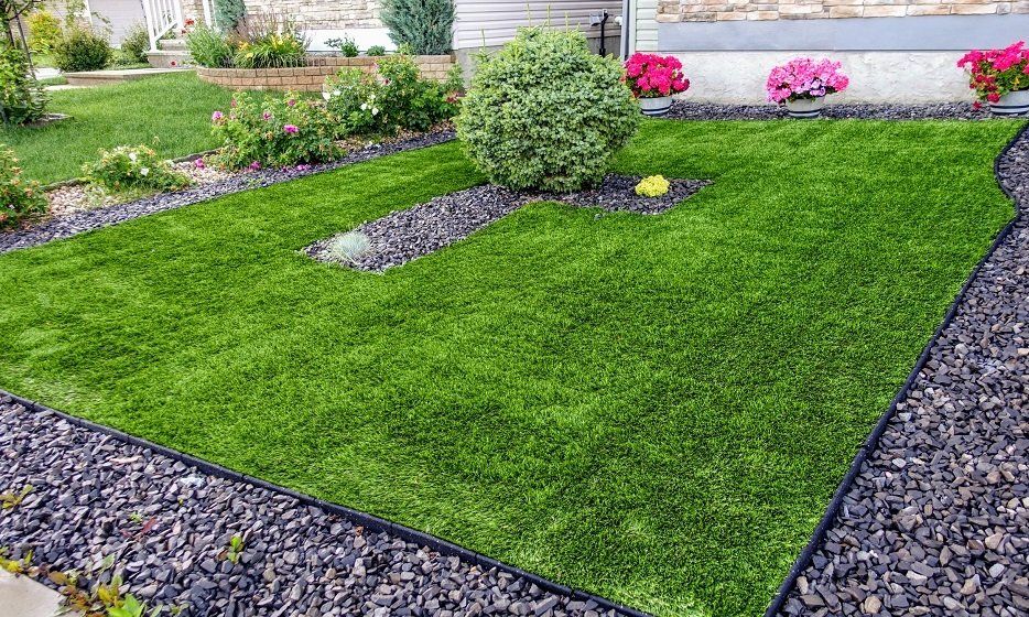 Front Yard with Nice Flowers and Shrubs Surrounding It | Longmont, CO | Sunny Slope Sod Farm LLC