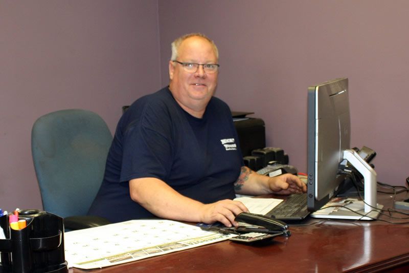 James from Wallington Truck Repair providing customer service and estimates in the Bergen County office