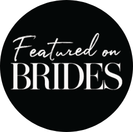A black circle with the words `` featured on brides '' on it