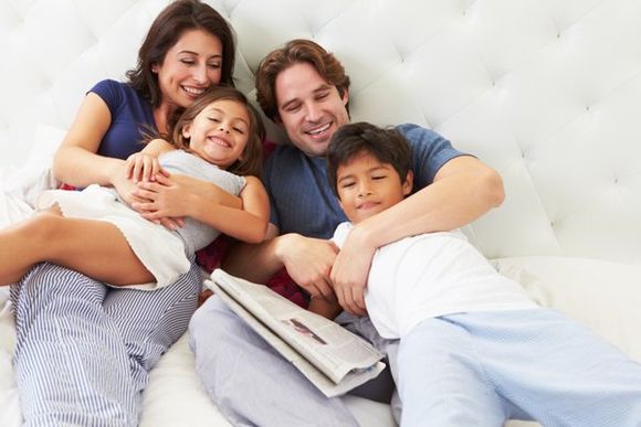 Family on Their Bed — Boone NC — Boone Heating & Air Conditioning Inc