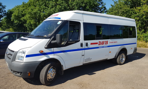 white bus for airport transfer
