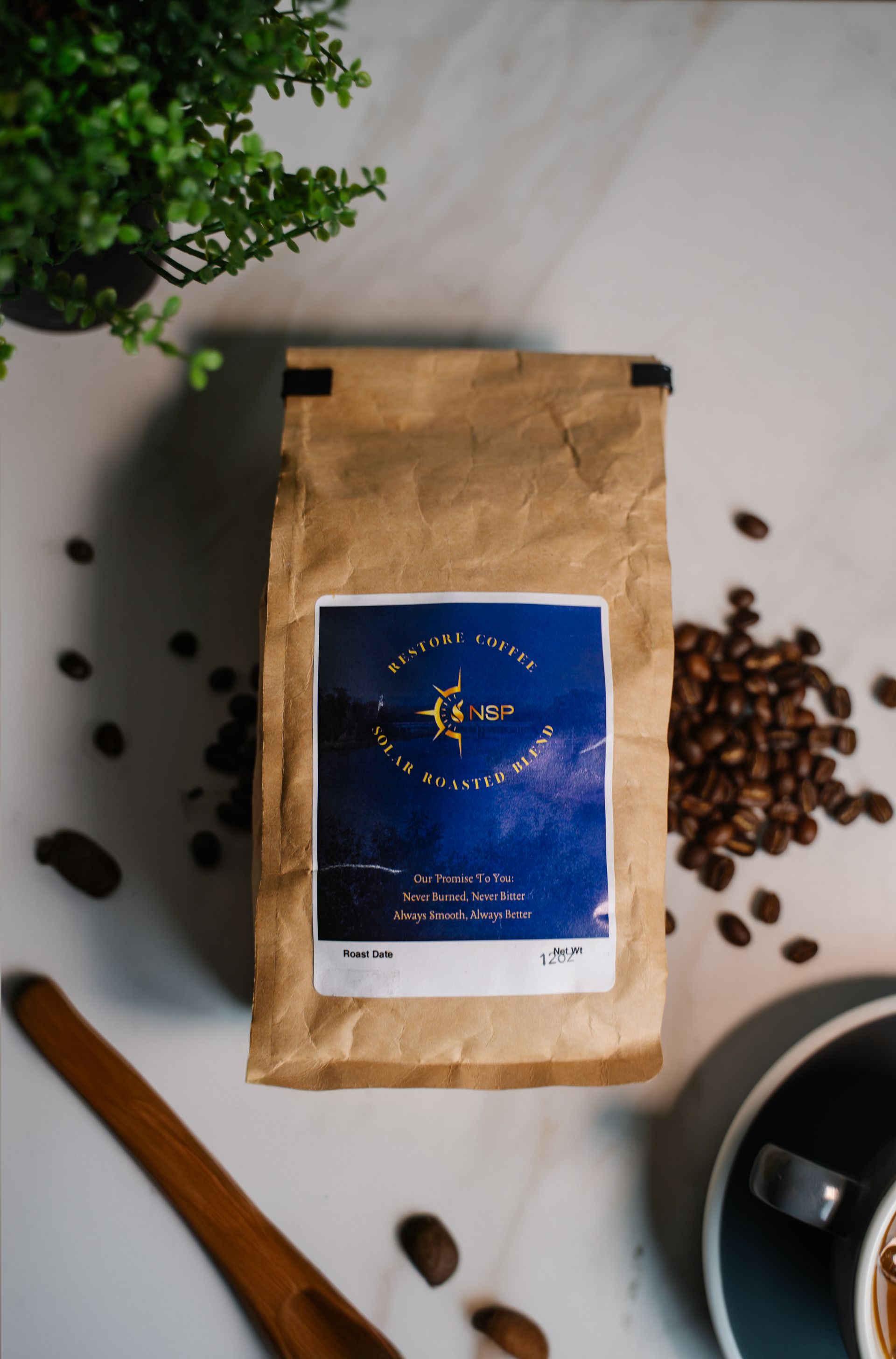 A bag of coffee with a blue label on it