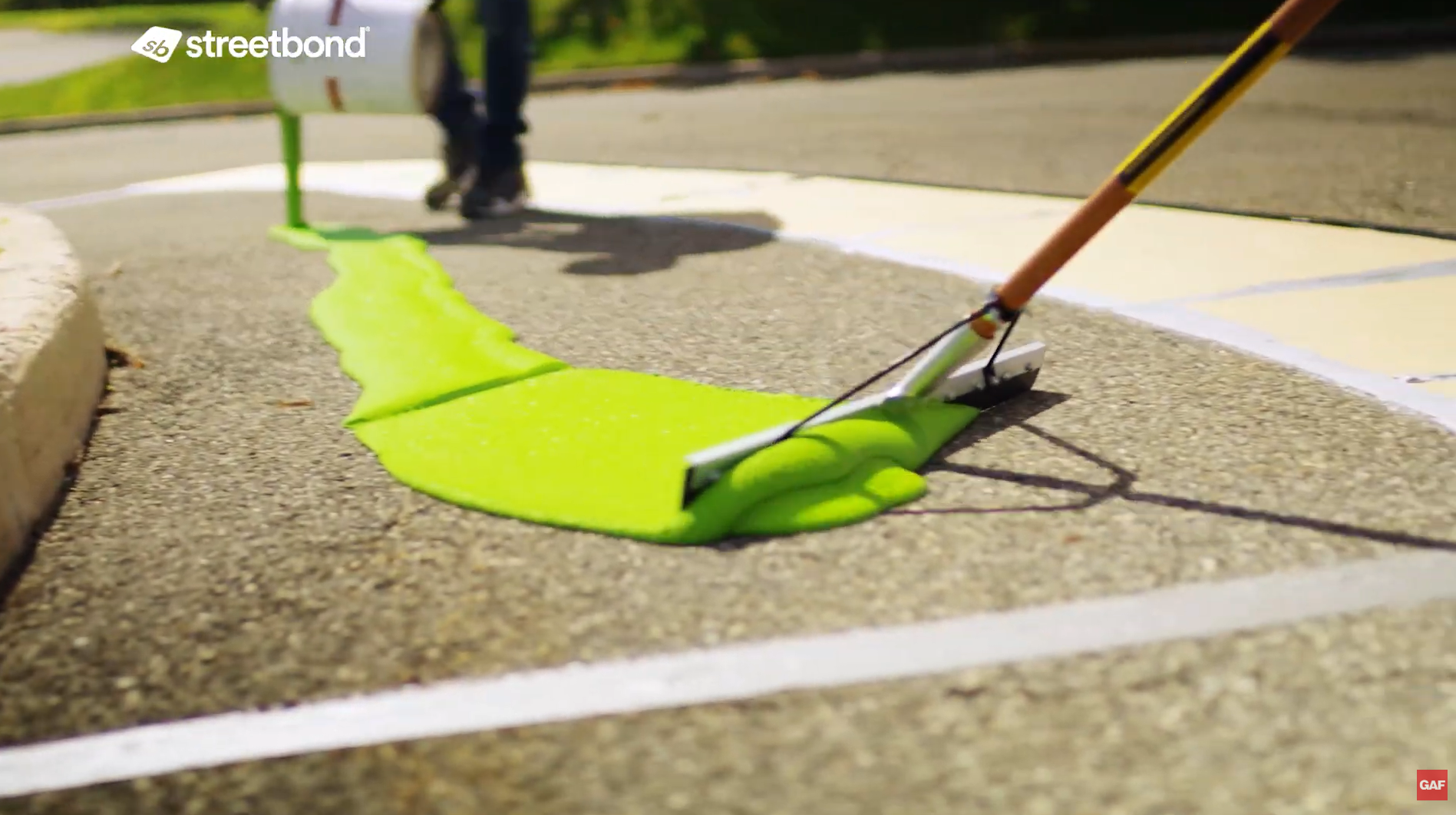 A man standing next to a sign that says caution