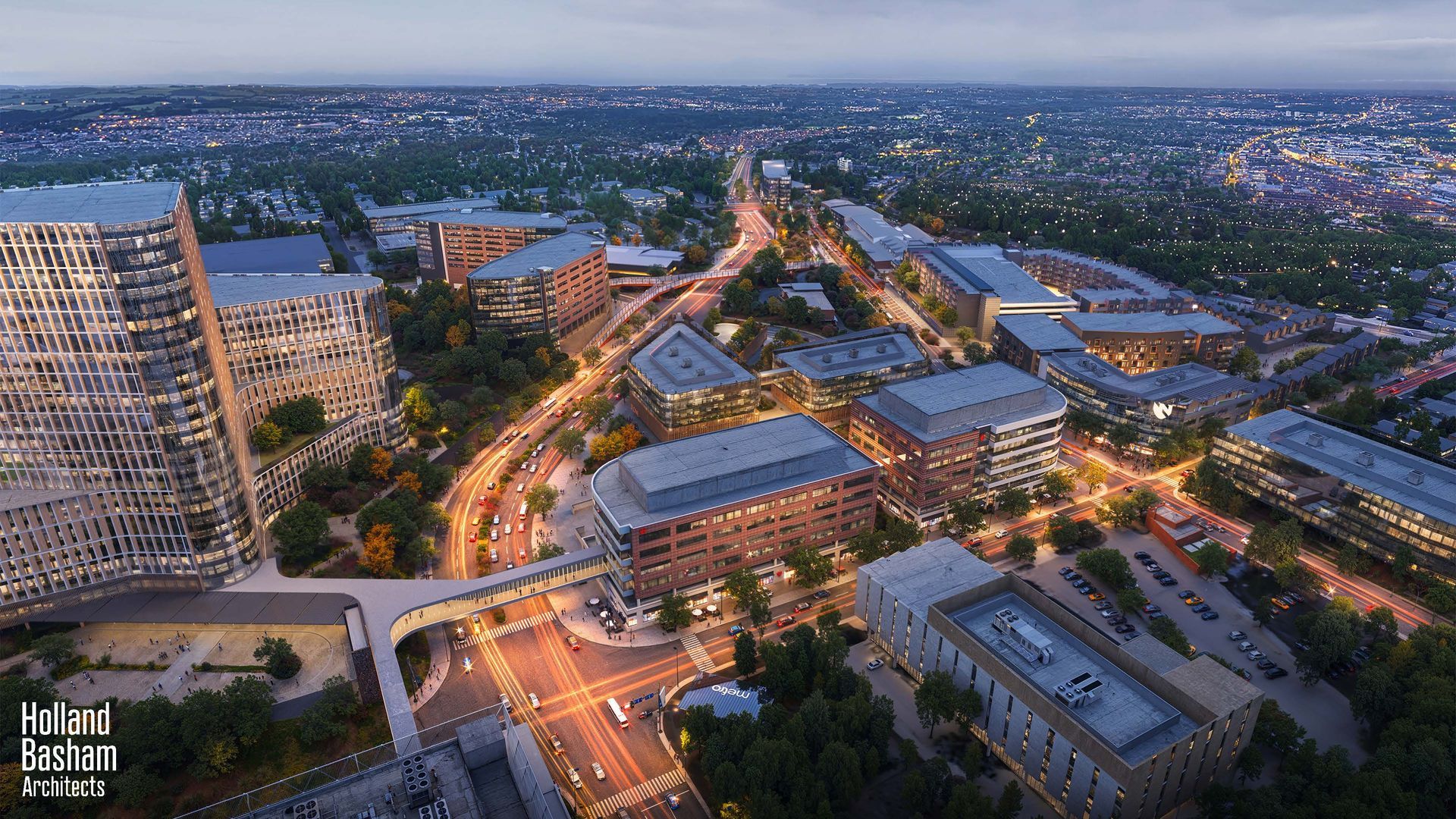 Aerial view of a modern city at dusk with illuminated buildings, roadways, and cars.