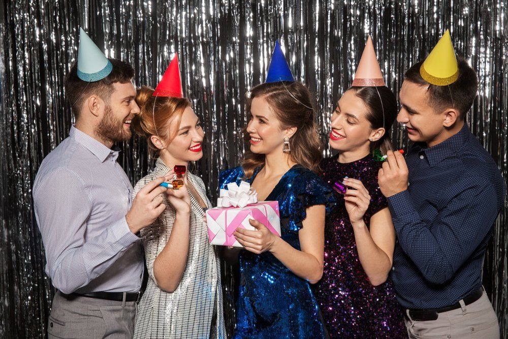 Image of three girls and two boys in a birthday party