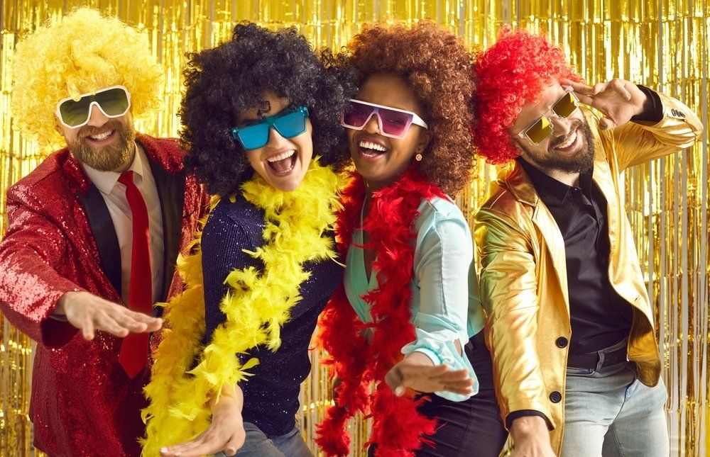 image of two guys and two girls in a birthday partyd