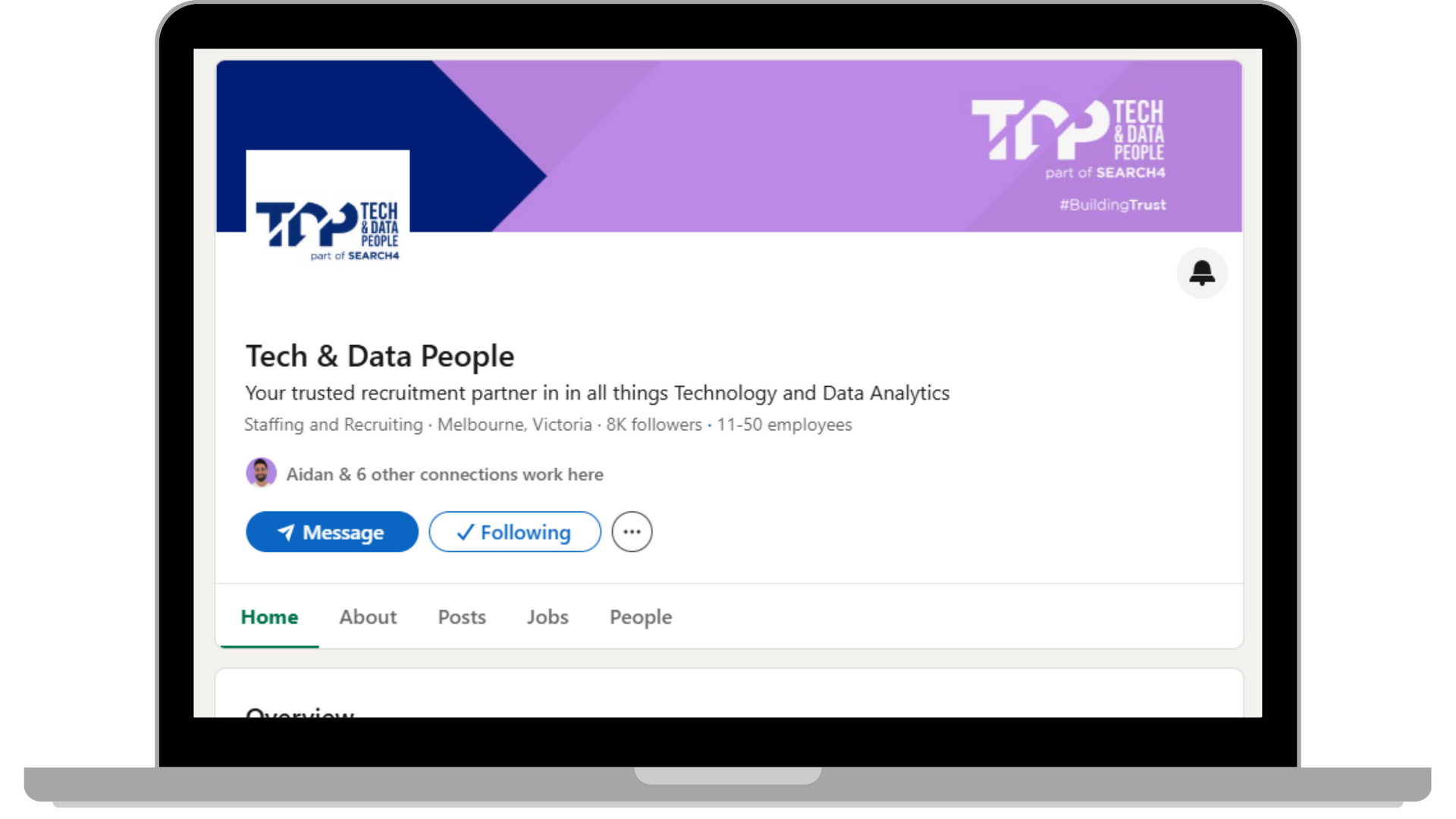 Laptop screen displaying the Tech & Data People LinkedIn page. Company logo, banner, and profile details are visible.