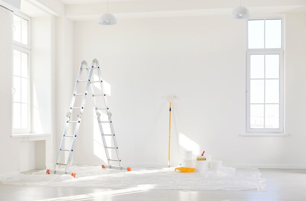 A White Room With ladder and paint roller — Prota NT in Howard Springs, NT