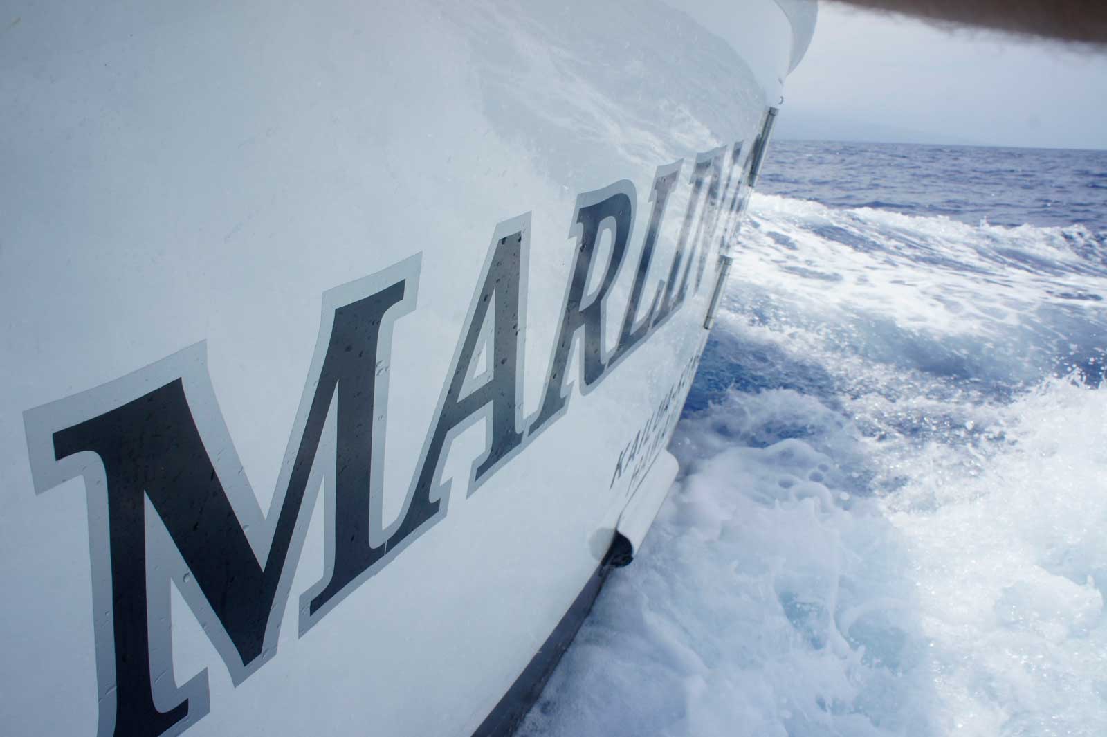 Marlin Grando Family Fishing Charter Boat Name on Boat