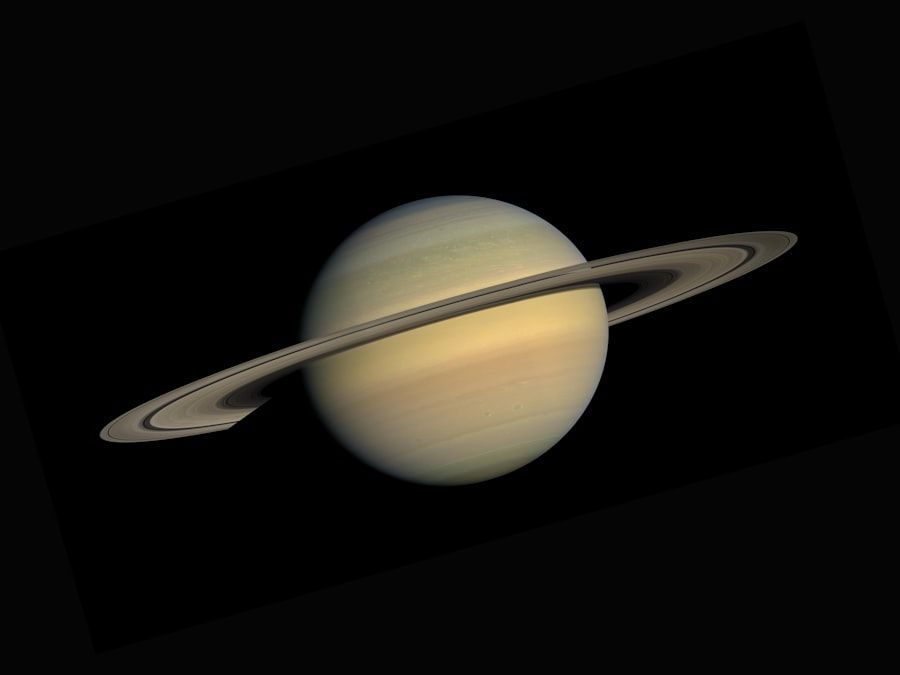 Saturn with its iconic ring system — representing designAmerica's outer solar system mission heritage
