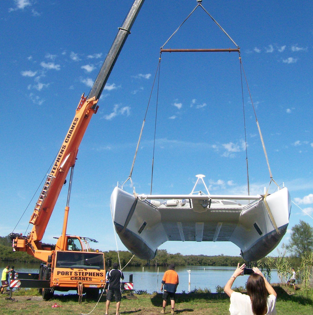 A Group Of Scissor Lifts Are Parked Next To Each Other — Port Stephens Cranes In Port Stephens, NSW